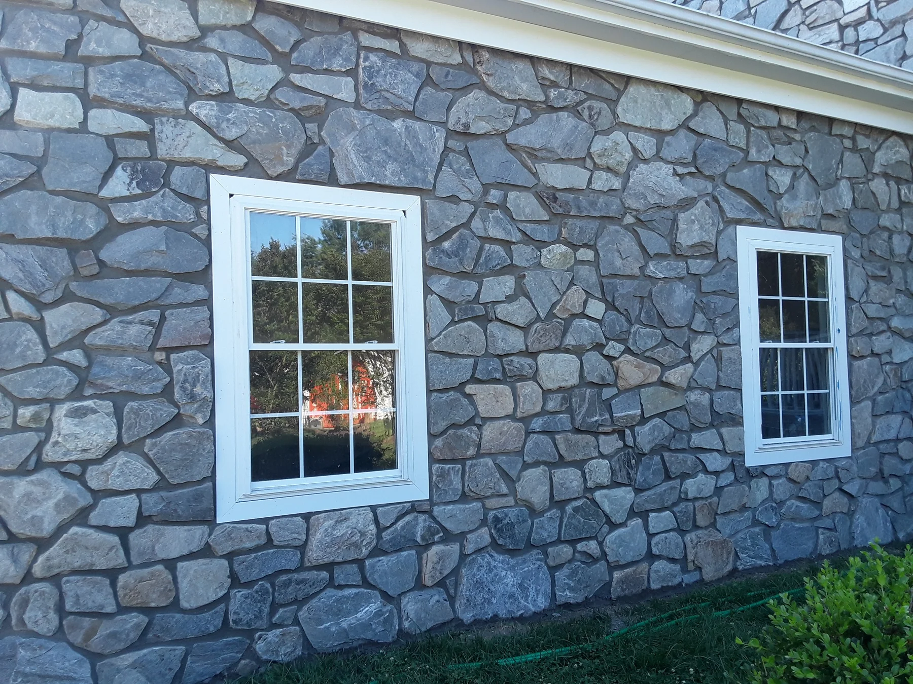 Stone wall around a home window