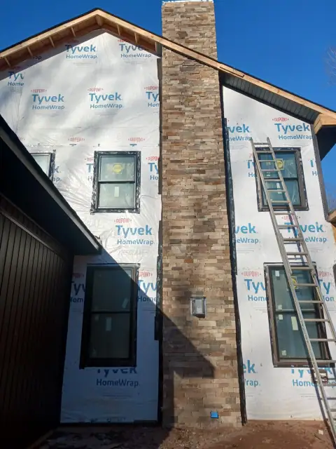 Chimney construction or repair in progress by F. Stone Designs