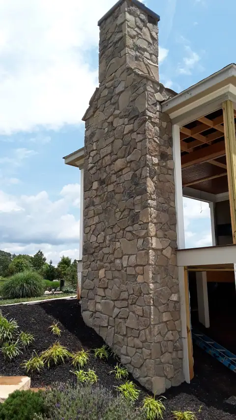 Stone chimney masonry by F. Stone Designs