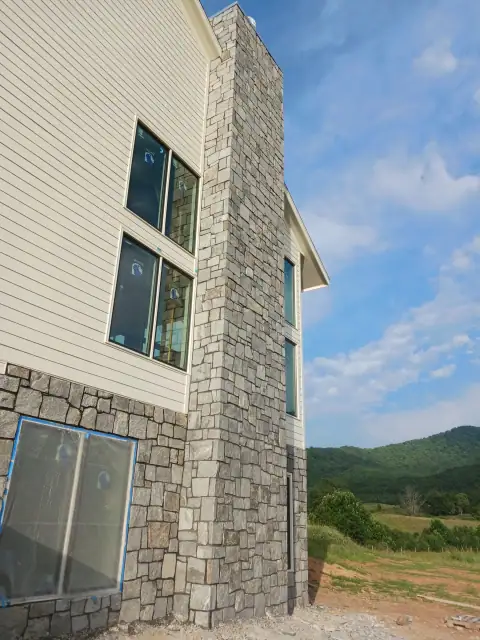Stone chimney masonry by F. Stone Designs