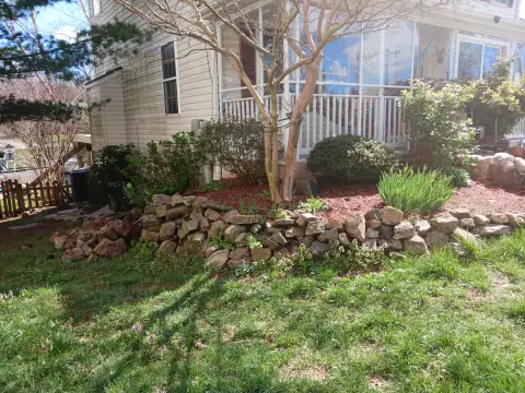 Renovated garden stone wall