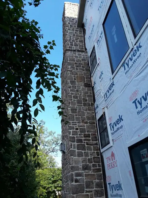 Stone chimney masonry by F. Stone Designs