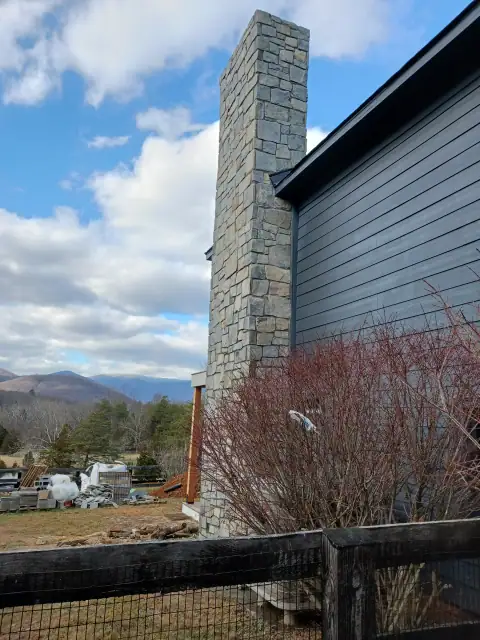 Stone chimney masonry by F. Stone Designs